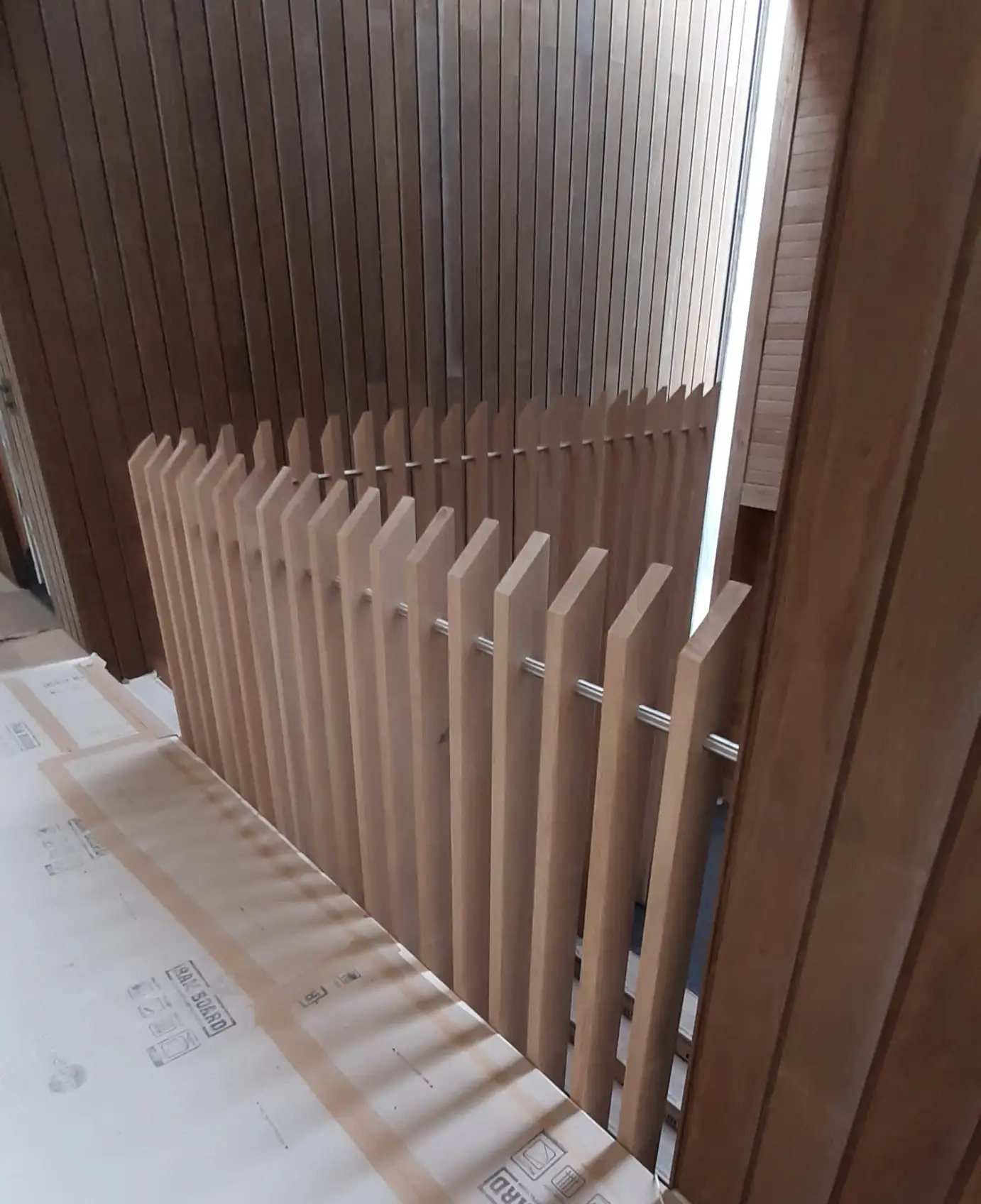 Restored period staircase with wooden railing in a Sussex home