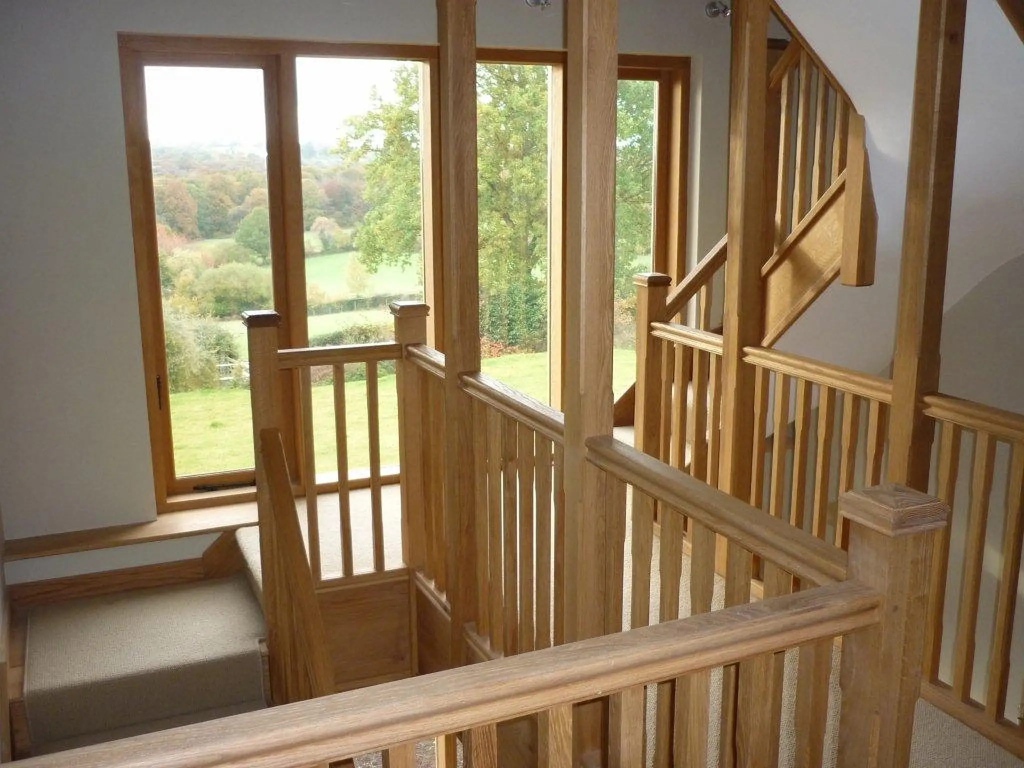 Oak bannisters and stair treads installed in a new build