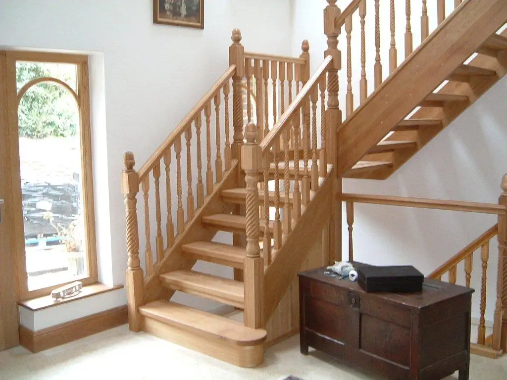 Hand-built oak staircase with turned bannisters and twisted spindles