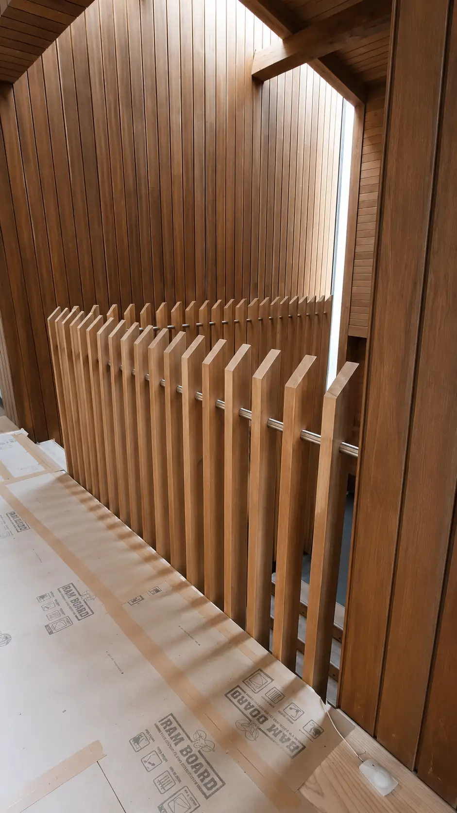 Detail of vertical slatted balustrade on a Forest Joinery feature staircase